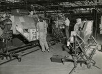 Workers assembling P-38 Lightning fighters at the Vultee Aircraft Corporation factory, Nashville, TN