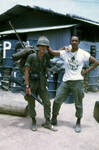 Members of the 1st SIgnal Brigade, Qui Nhơn, Vietnam, 1969-1970 (man in full uniform and one in t shirt)