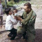 Christopher Ammons with Vietnamese children, Vietnam